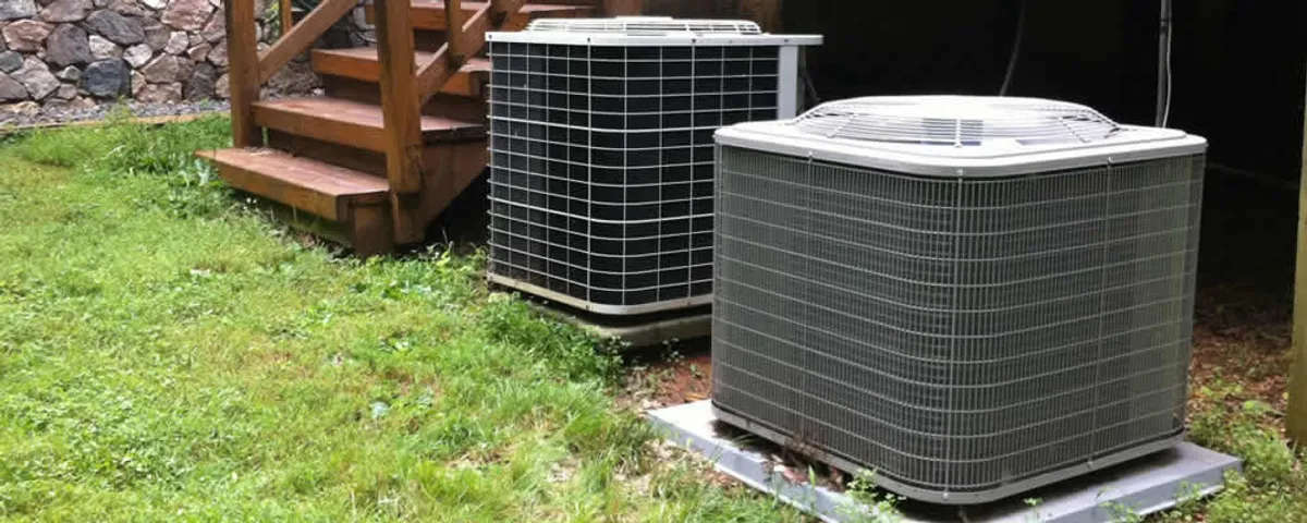Heat pump installation and service units outside a home in Loveland, CO